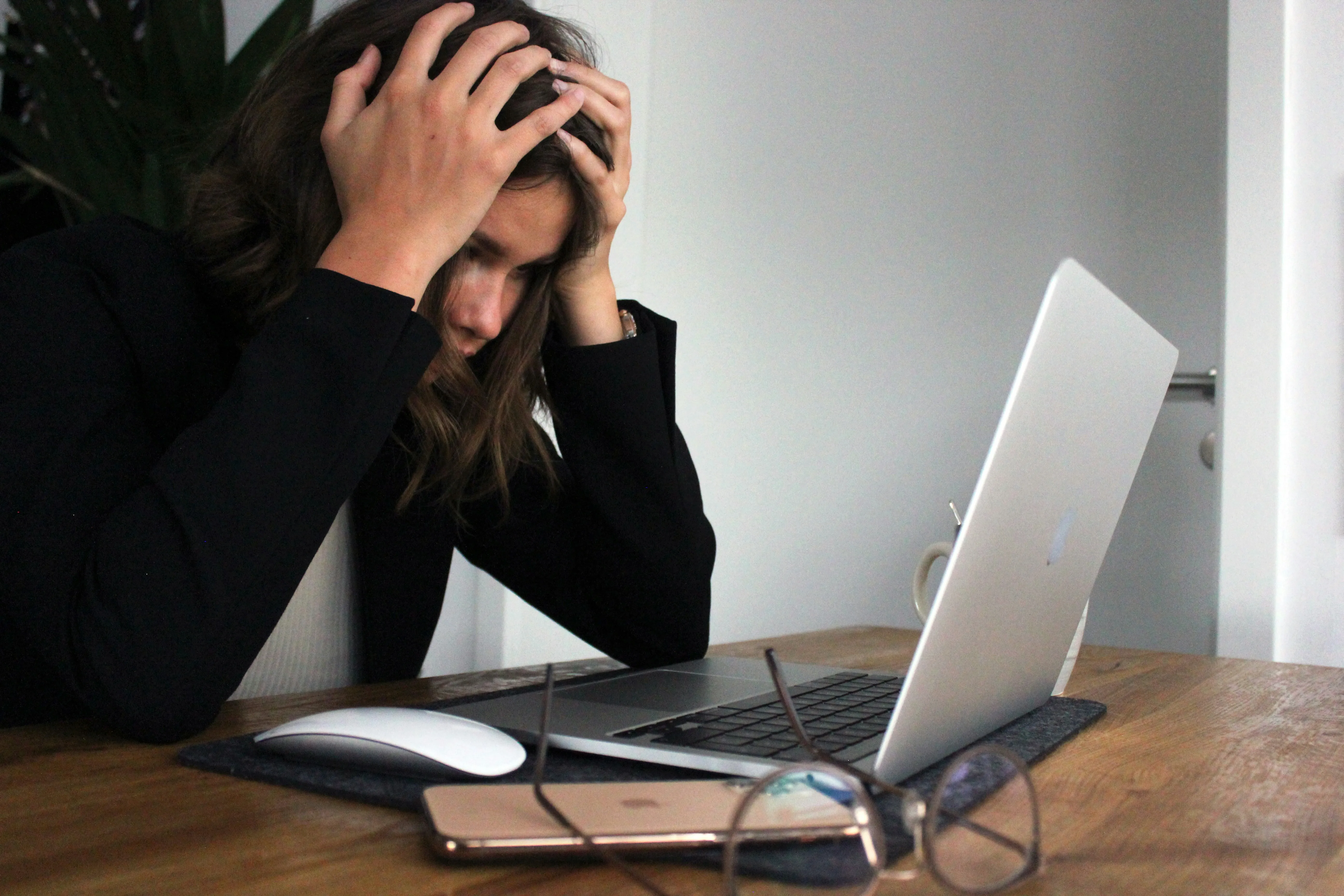 Woman frustrated at her computer.