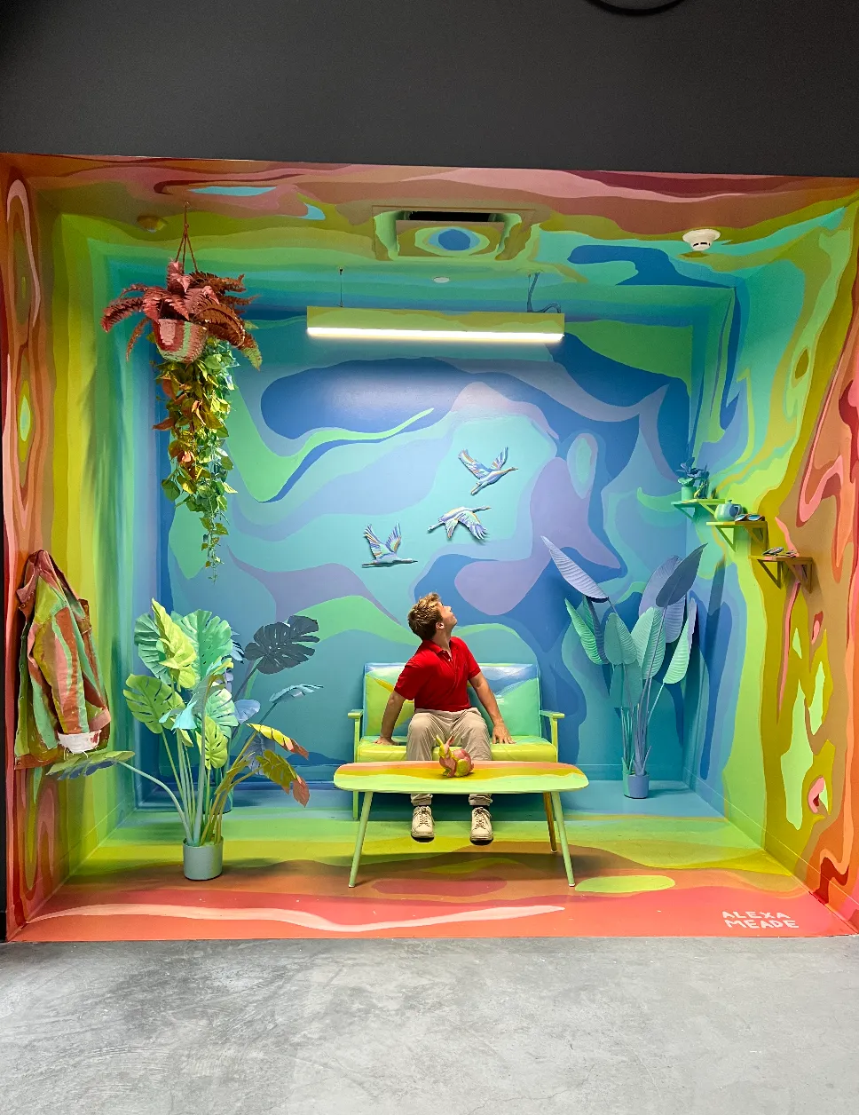 Mitchell at YouTube and Google Headquarters in a brightly colored room.